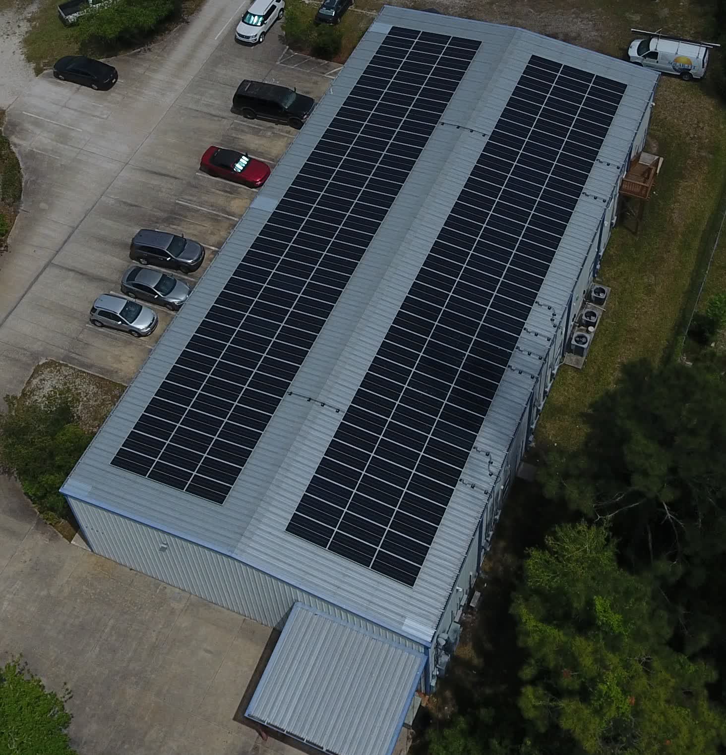 Aerial view of a Solar-Fit commercial install covering a metal warehouse roof