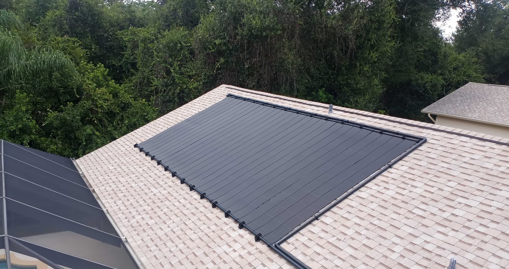 Solar pool heater installed by Solar-Fit on a shingle roof