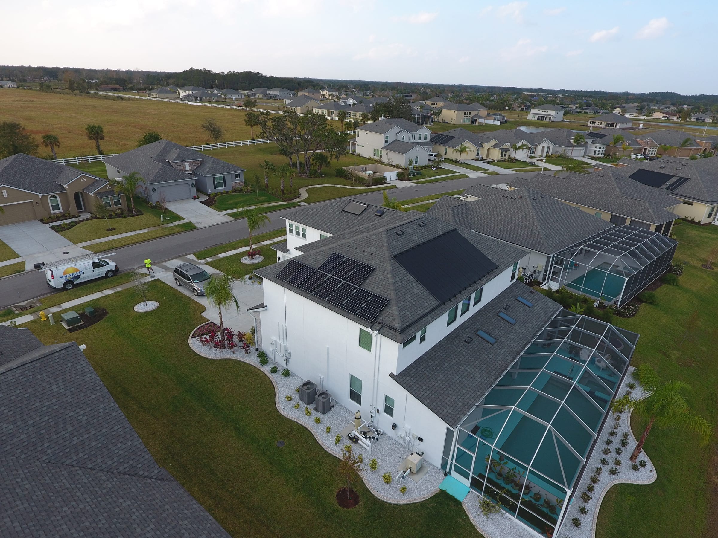 Rooftop array and pool home · Port Orange, a Solar-Fit install