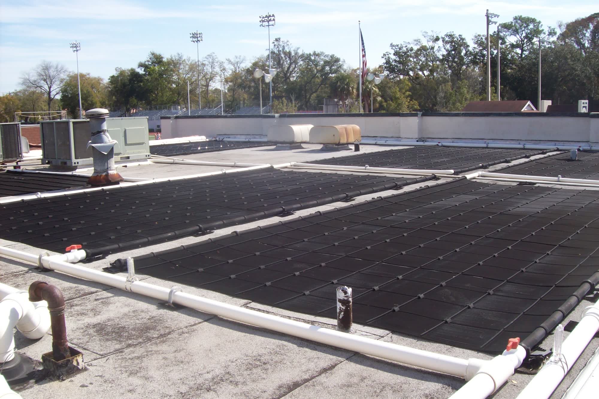Flat school roof with solar array installed by Solar-Fit